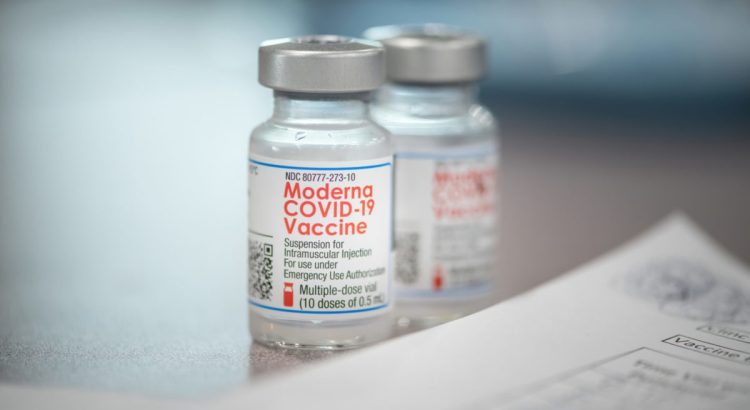 Grayslake, IL - January 30, 2021: Drive-through indoor COVID-19 vaccination facility at the Lake County Fairgrounds in Grayslake. The facility is dispensing both the Moderna and Pfizer vaccine.